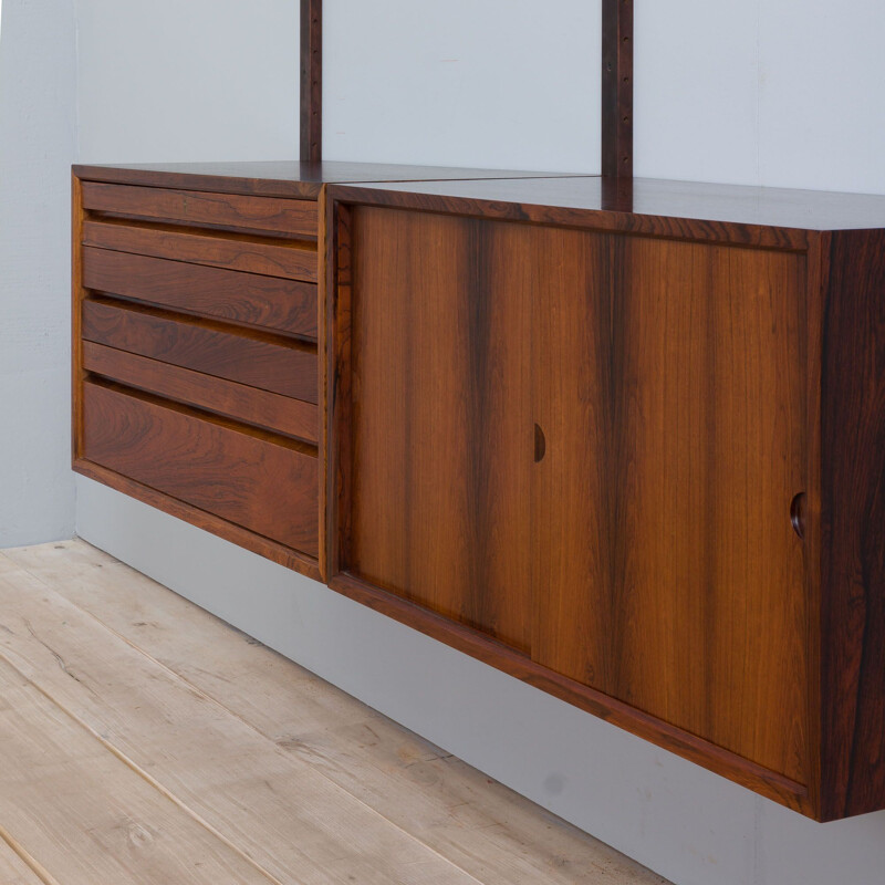 Vintage rosewood wall unit by Poul Cadovius