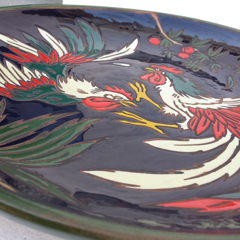Vintage ceramic wall plaque of fighting roosters