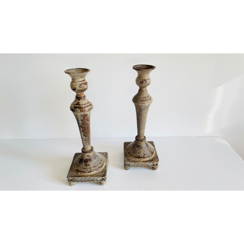 Pair of vintage candle holders in light patina metal