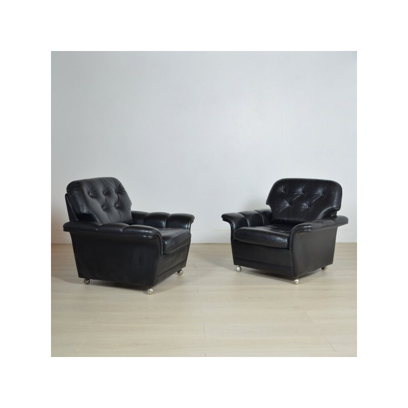Pair of black leather upholstered chairs - 1960s