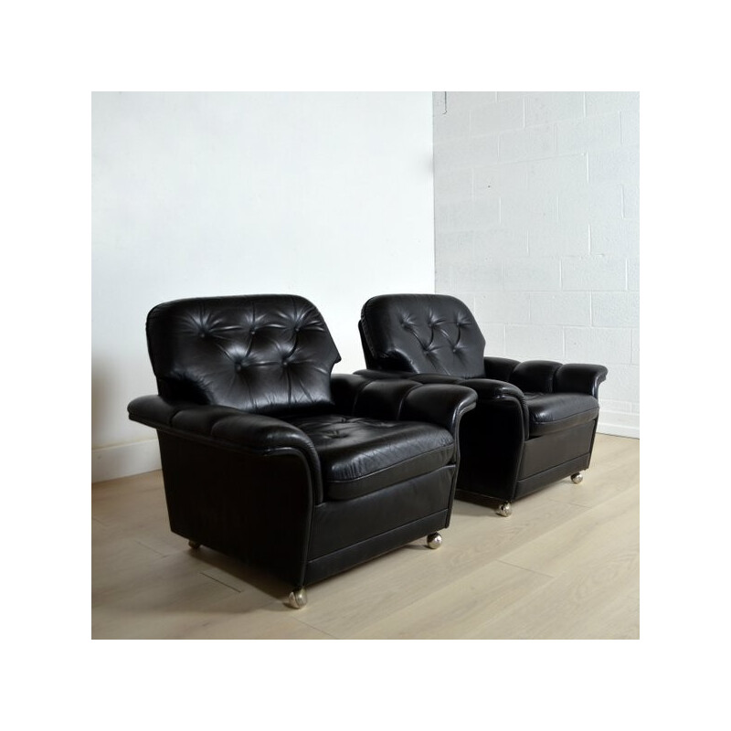 Pair of black leather upholstered chairs - 1960s