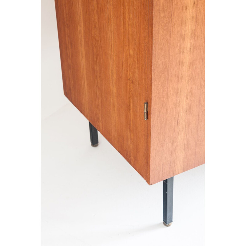 Vintage four door cabinet in teak with adjustable iron legs, France 1960