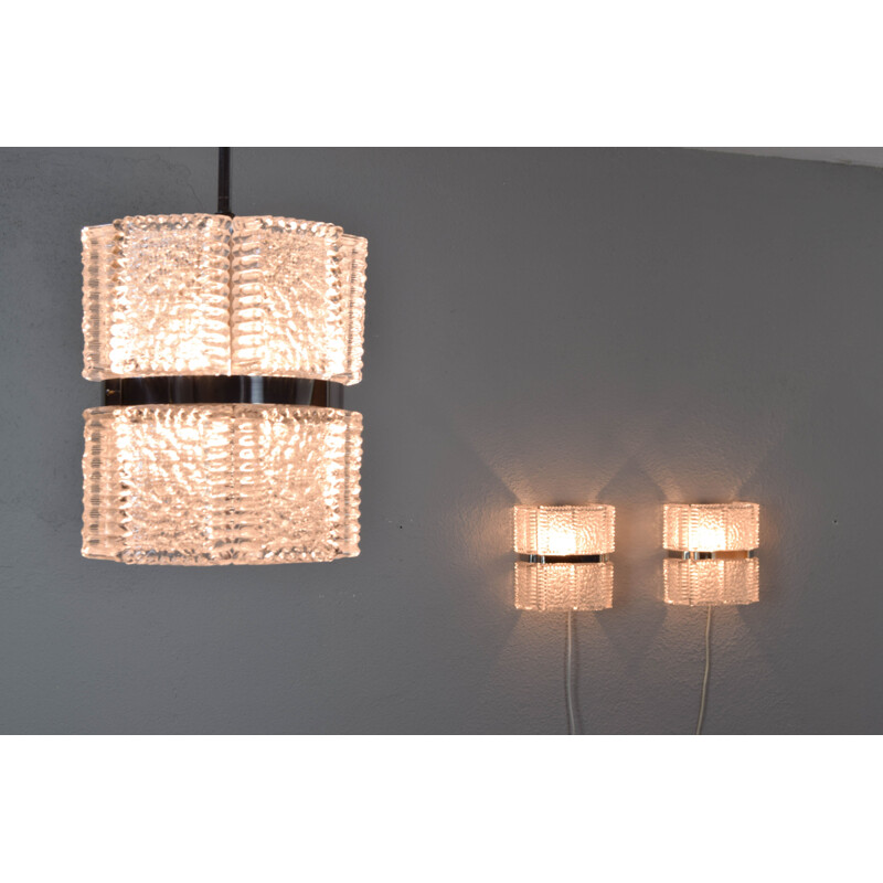 Mid century pair of wall lamps and chandelier in textured crystal by Kaiser Leuchen, Germany 1960s