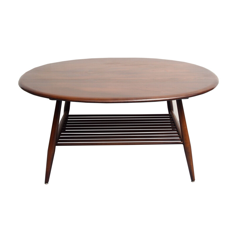 Vintage coffee table in dark wood by Ercol, UK 1950s