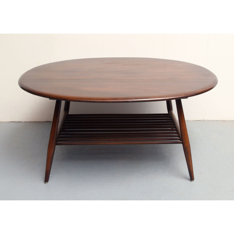 Vintage coffee table in dark wood by Ercol, UK 1950s