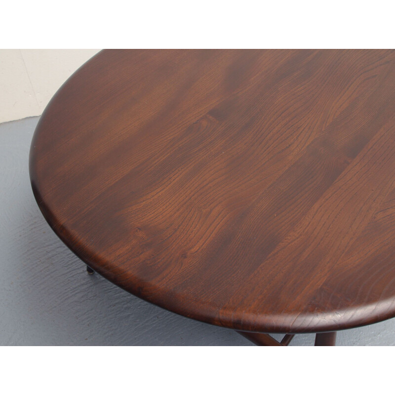 Vintage coffee table in dark wood by Ercol, UK 1950s