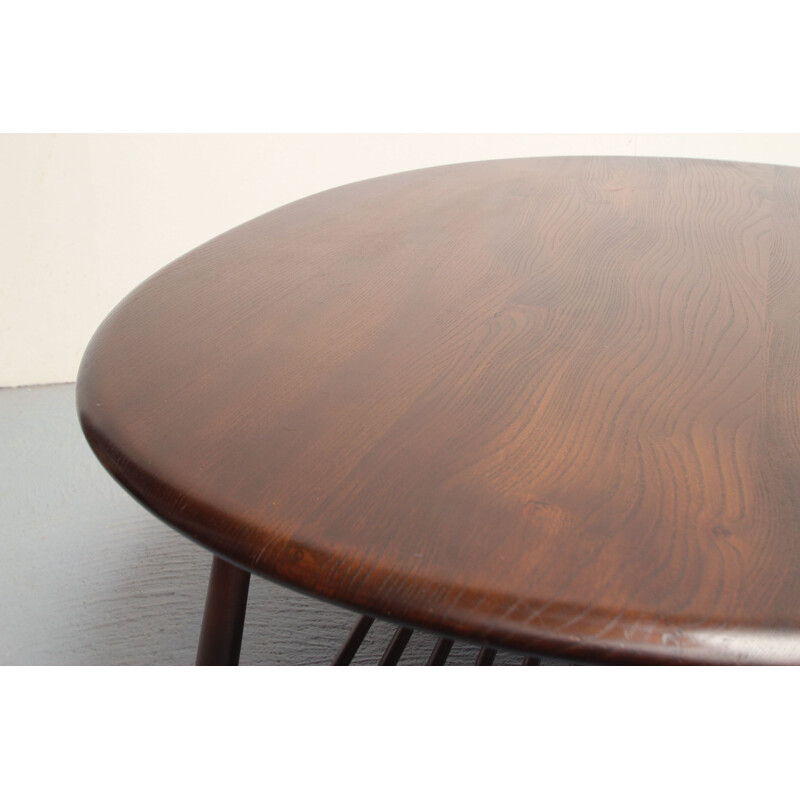 Vintage coffee table in dark wood by Ercol, UK 1950s