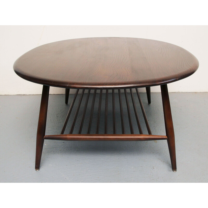 Vintage coffee table in dark wood by Ercol, UK 1950s