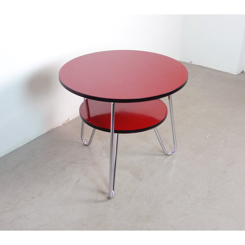 Red round coffee table in steel - 1950s