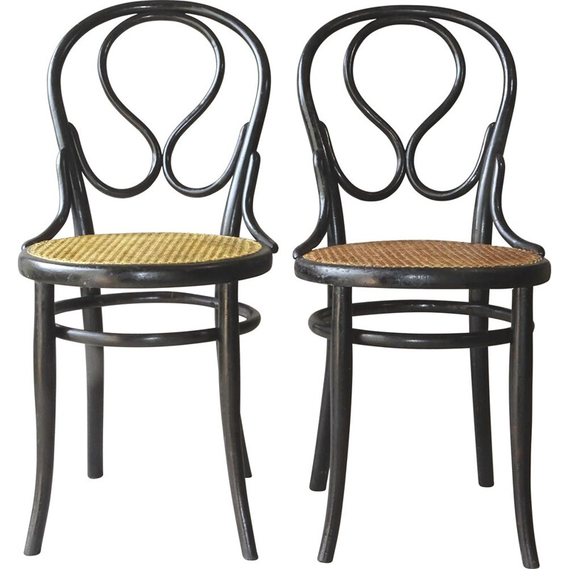 Pair of vintage chairs N 20 "Omega" in cane