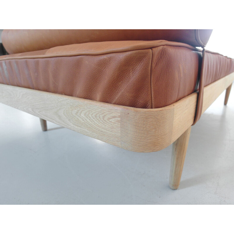 Vintage Danish bed in solid oakwood with leather mattress by Horsnaes Møbler, 1956