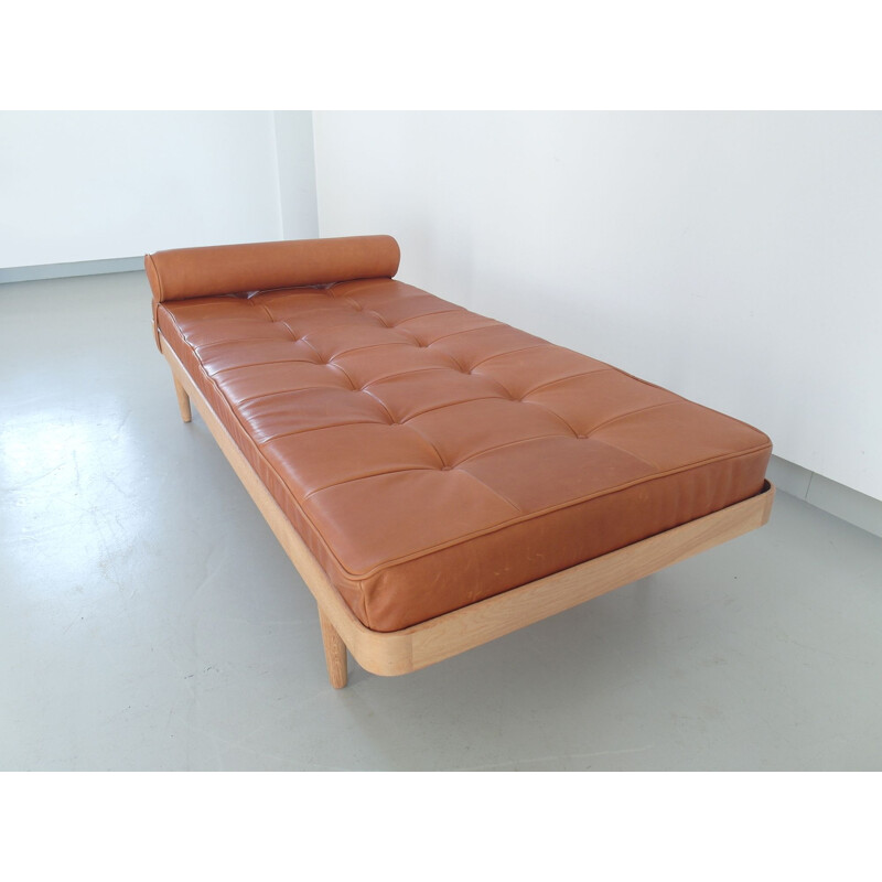 Vintage Danish bed in solid oakwood with leather mattress by Horsnaes Møbler, 1956