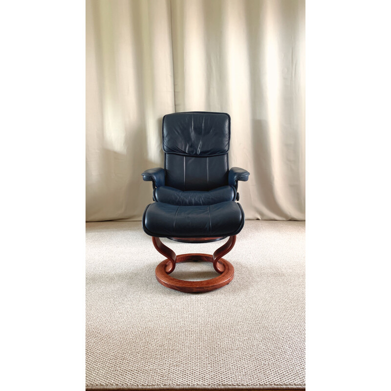 Mid century adjustable swivel leather armchair & ottoman by Ekornes Stressless, 1980s