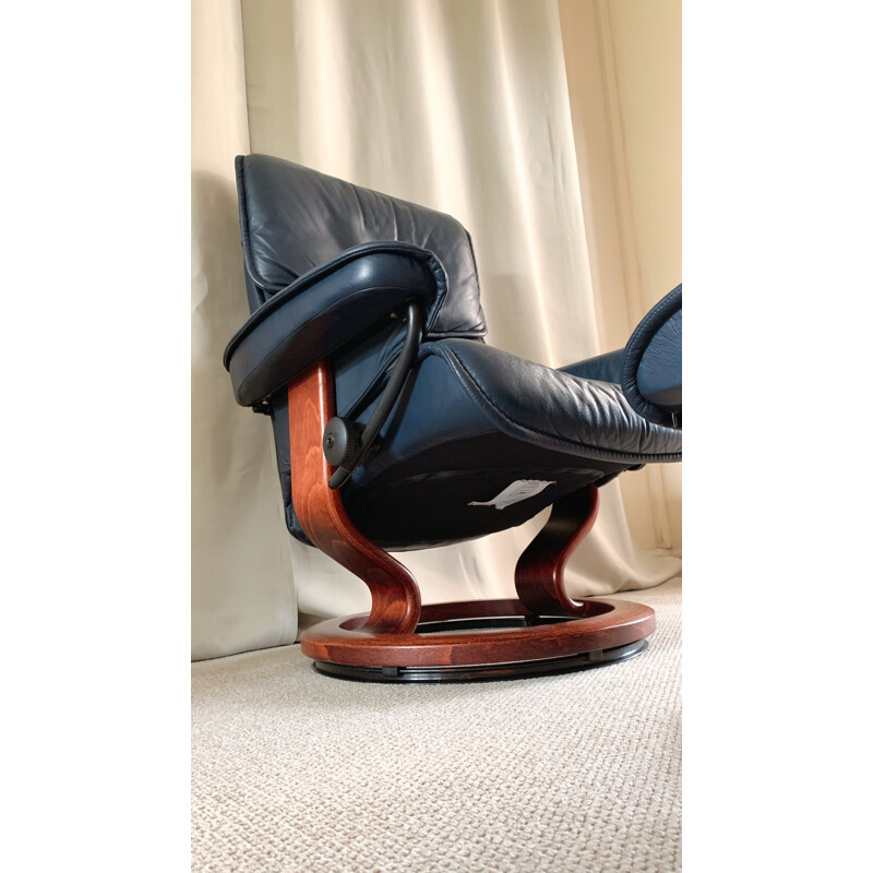 Mid century adjustable swivel leather armchair & ottoman by Ekornes Stressless, 1980s