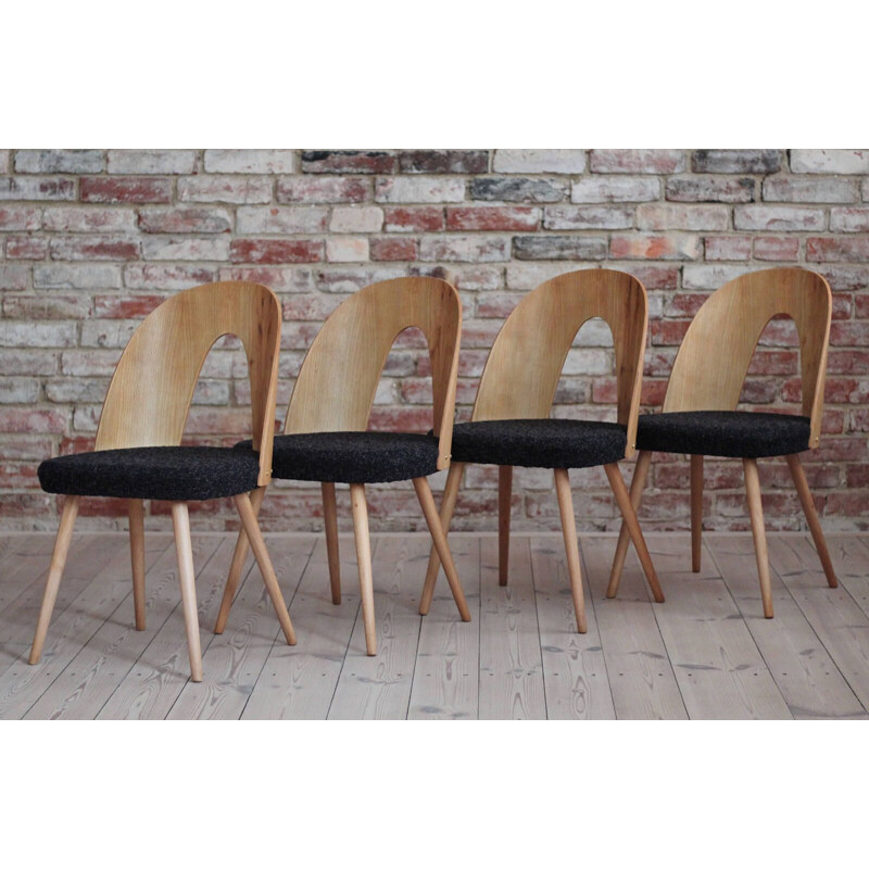 Set of 4 mid century dining chairs in black boucle by Antonin Šuman, 1960s