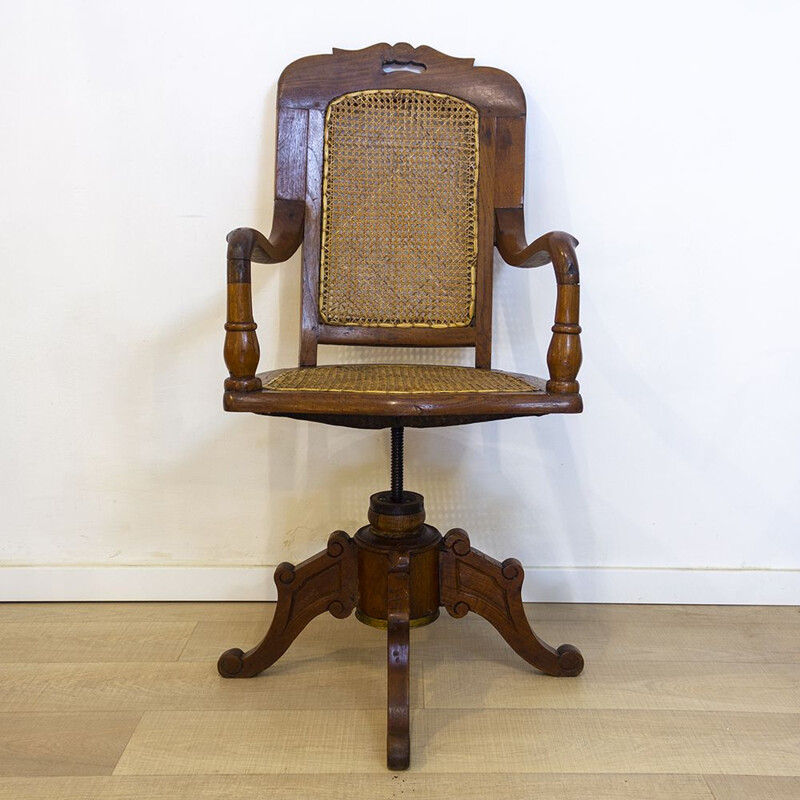Adjustable and swiveling vintage oak wood office chair