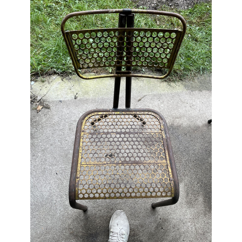 Vintage chair in perforated metal by René Malaval