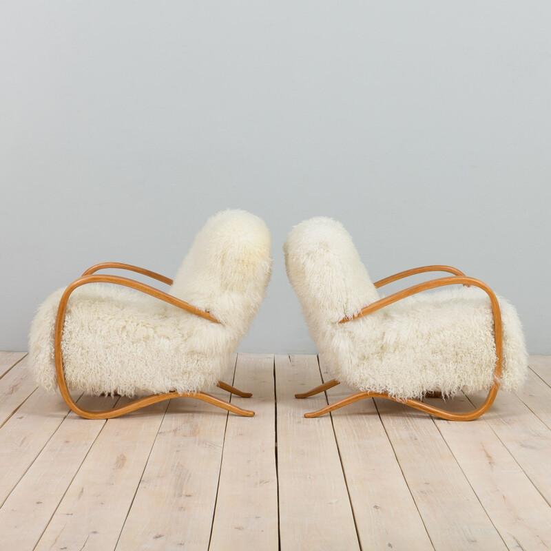 Pair of vintage armchairs model 269 in natural long hair sheepskin by Jindrich Halaba, 1930s