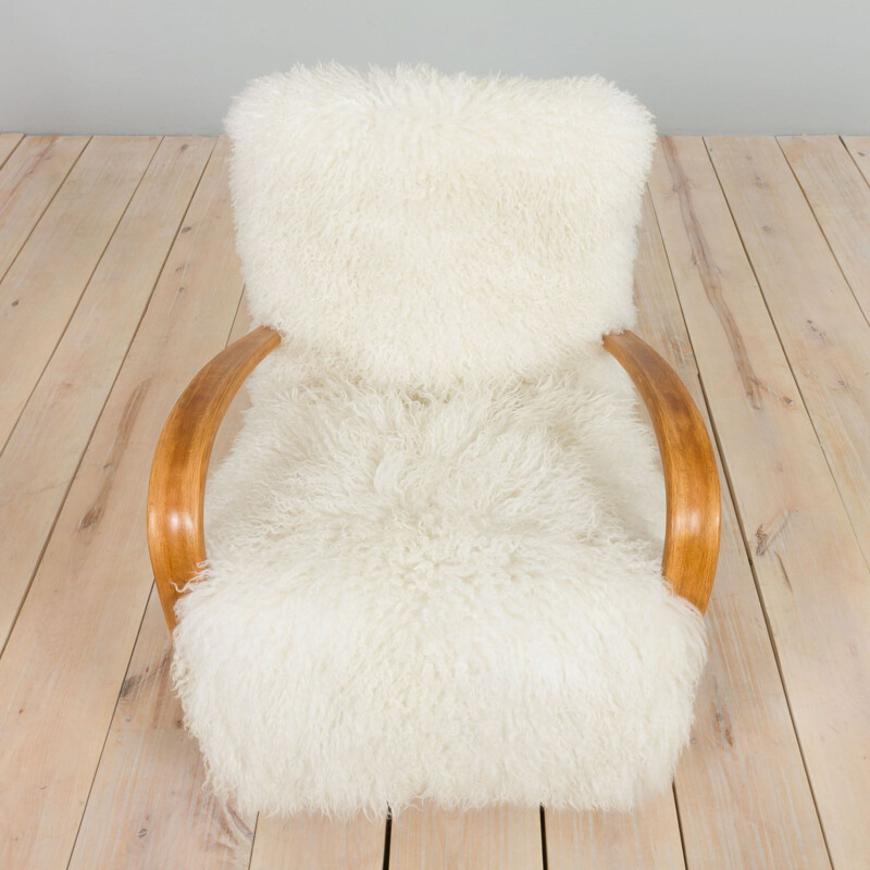 Pair of vintage armchairs model 269 in natural long hair sheepskin by Jindrich Halaba, 1930s