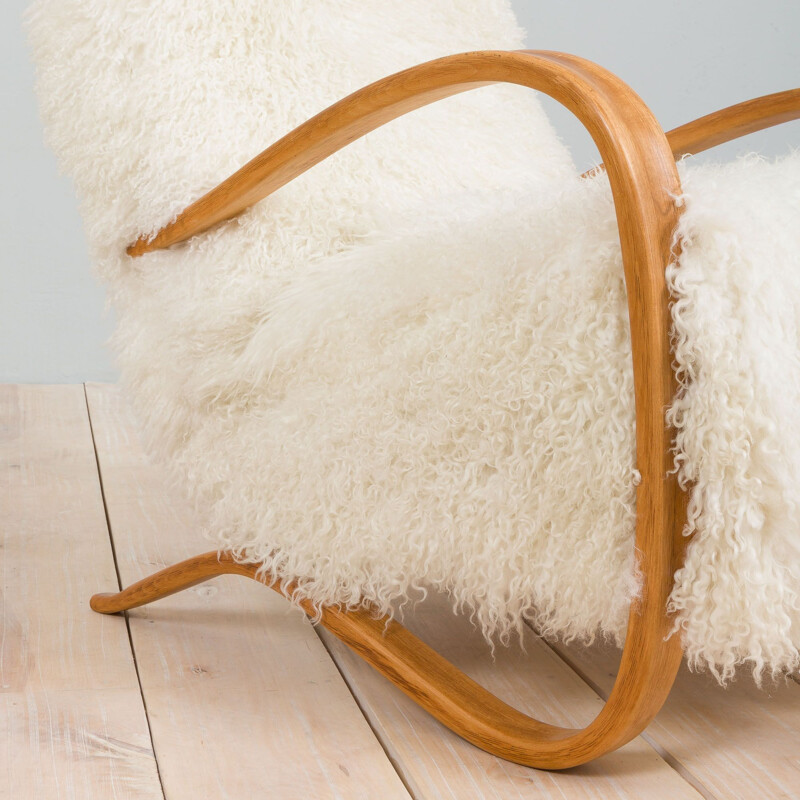 Pair of vintage armchairs model 269 in natural long hair sheepskin by Jindrich Halaba, 1930s