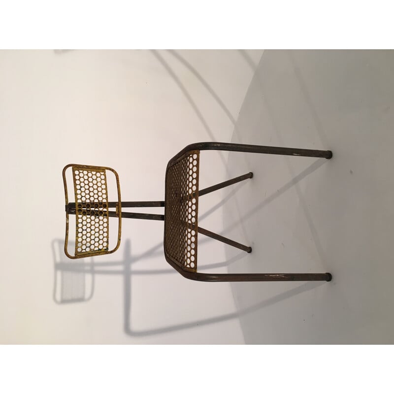 Vintage chair in perforated metal by René Malaval