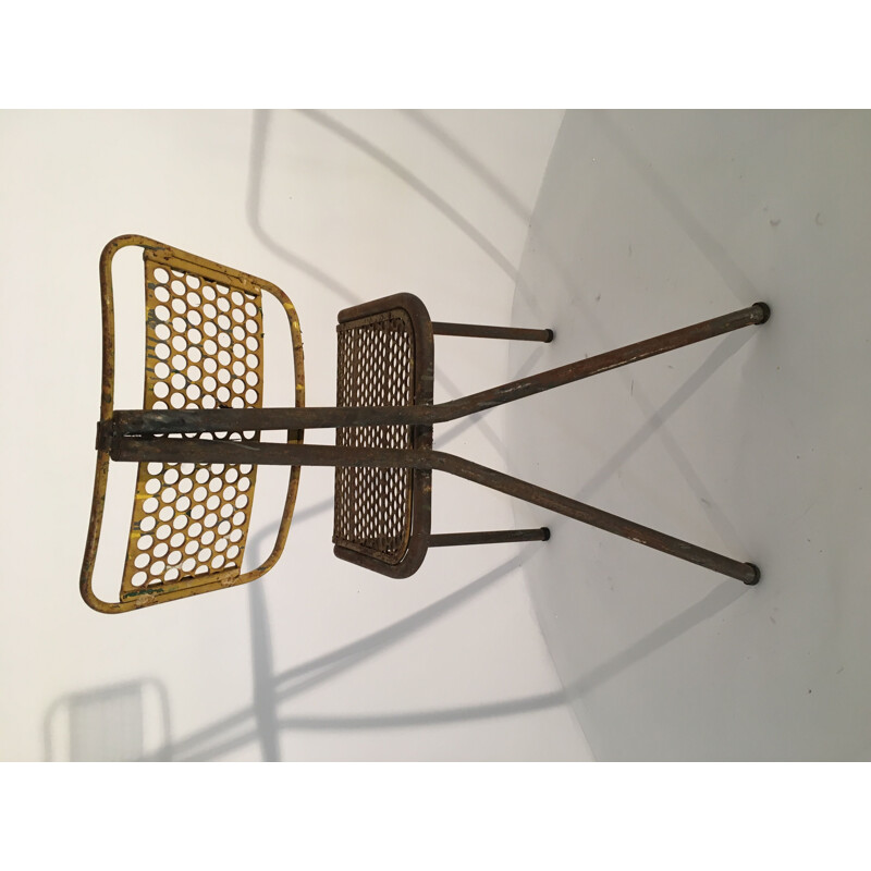 Chaise vintage en métal perforé de René Malaval