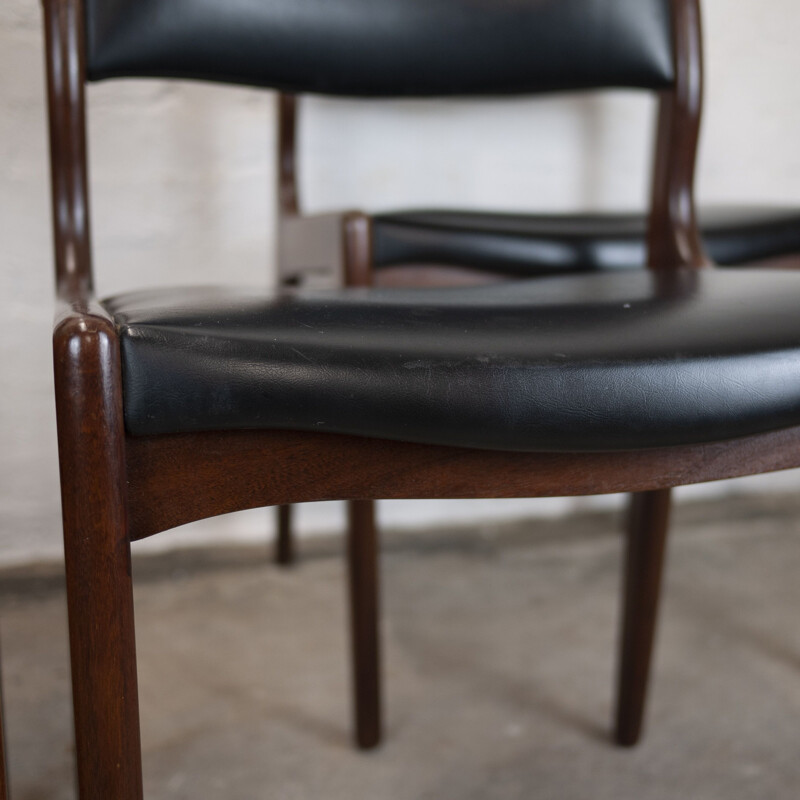 Set of 4 vintage dining chairs in teak and black vinyl by Johannes Andersen for Uldum Møbelfabrik, 1960s