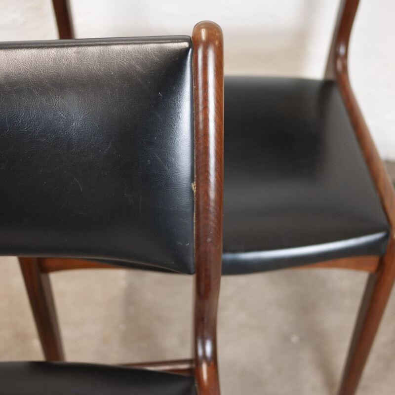 Set of 4 vintage dining chairs in teak and black vinyl by Johannes Andersen for Uldum Møbelfabrik, 1960s