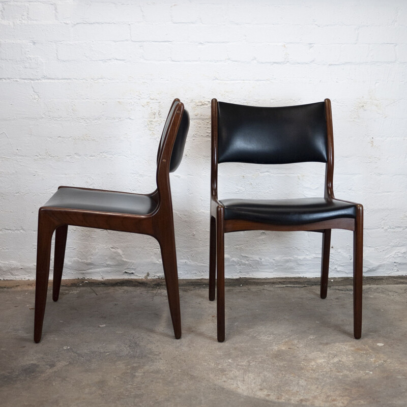 Set of 4 vintage dining chairs in teak and black vinyl by Johannes Andersen for Uldum Møbelfabrik, 1960s