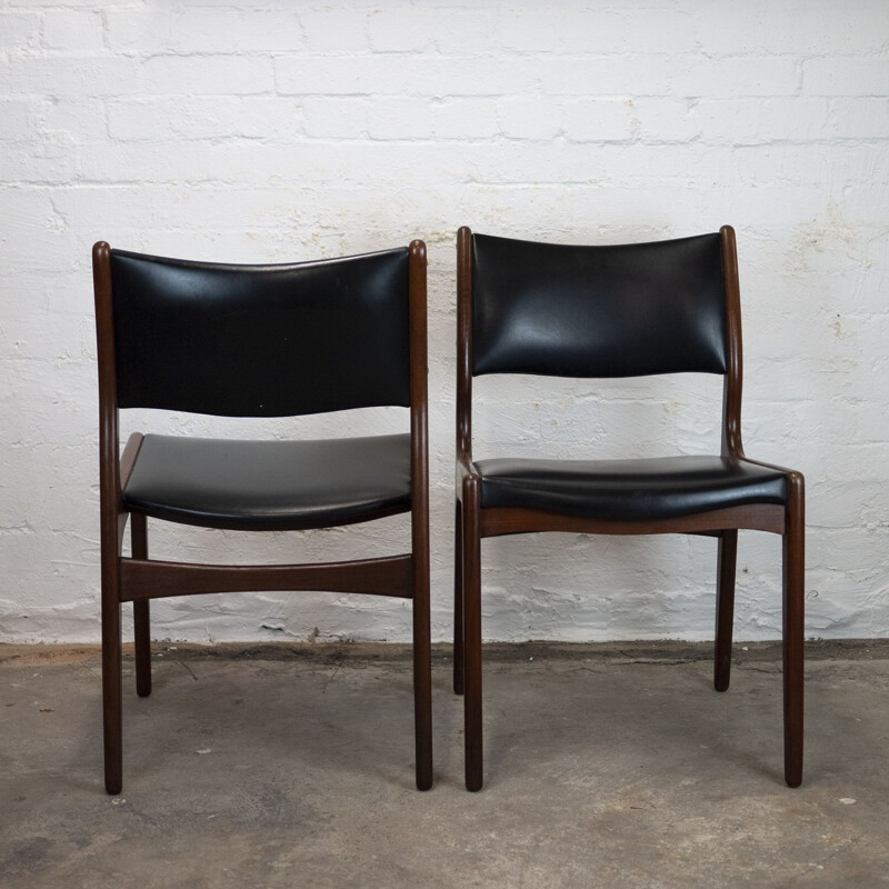 Set of 4 vintage dining chairs in teak and black vinyl by Johannes Andersen for Uldum Møbelfabrik, 1960s