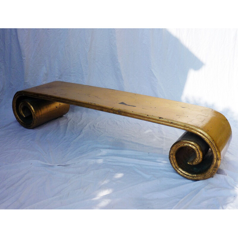 Vintage golden bench with wooden spiral