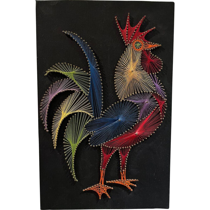 Vintage painting of a rooster in multicolored threads on a wood background, 1970