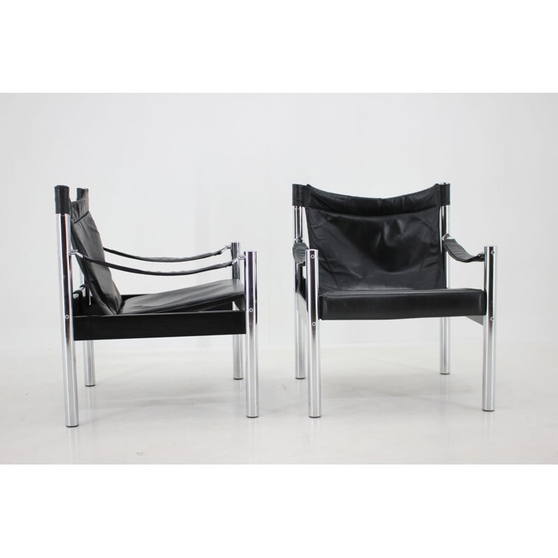 Pair of vintage black leather and chrome Safari armchairs by Johanson Design for Markaryd, 1970s