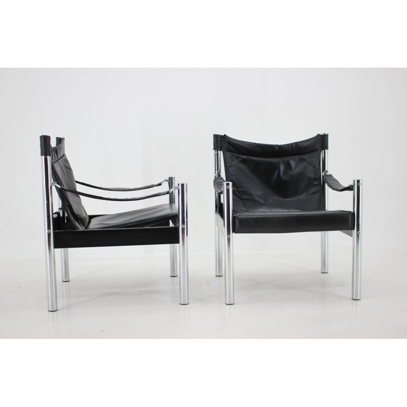 Par de cadeiras Safari em couro preto vintage e cromadas da Johanson Design para Markaryd, 1970