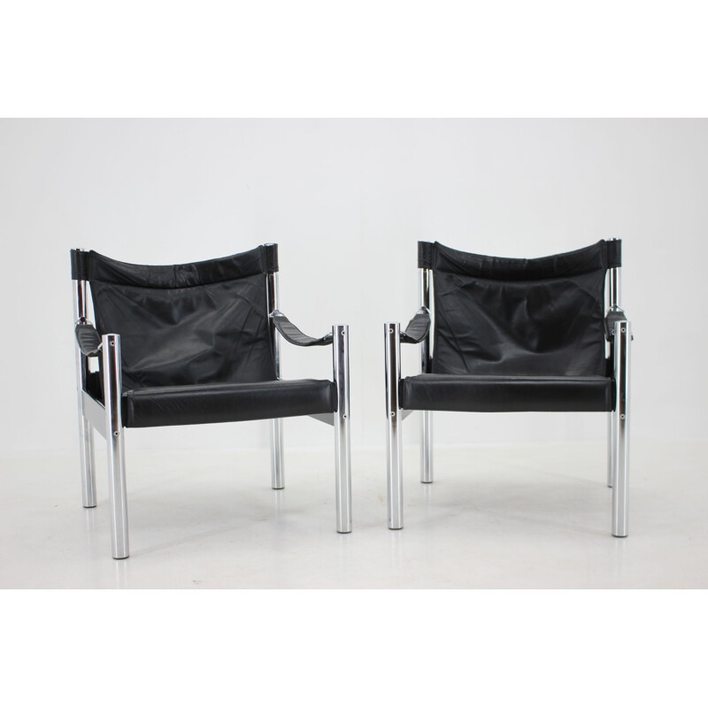 Pareja de sillas Safari vintage de cuero negro y cromo de Johanson Design para Markaryd, 1970