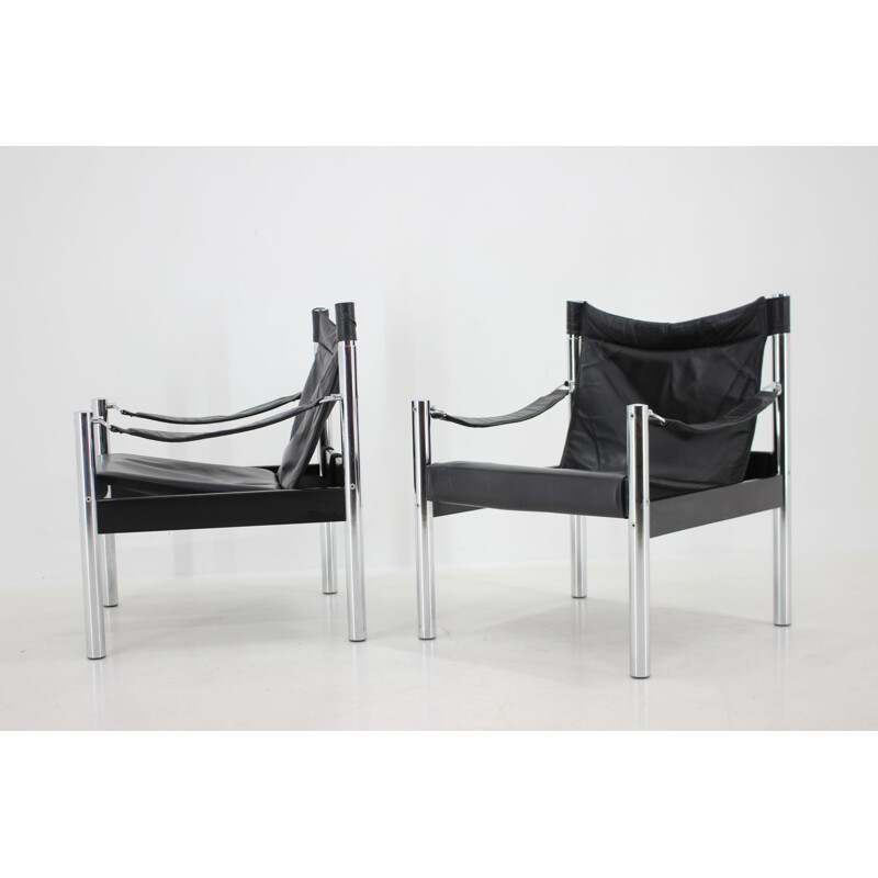 Par de cadeiras Safari em couro preto vintage e cromadas da Johanson Design para Markaryd, 1970