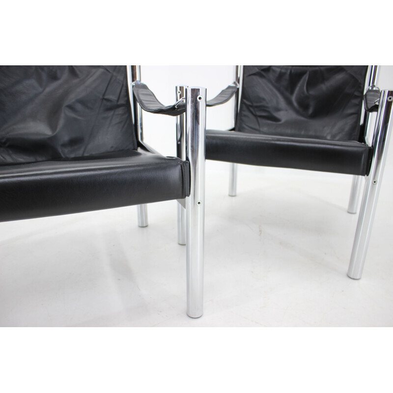 Pair of vintage black leather and chrome Safari armchairs by Johanson Design for Markaryd, 1970s