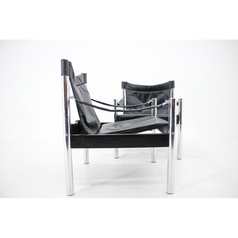 Pair of vintage black leather and chrome Safari armchairs by Johanson Design for Markaryd, 1970s