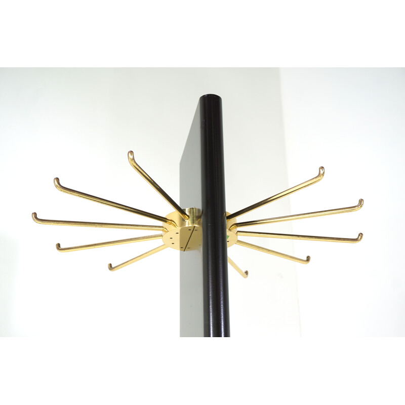 Vintage black and brass swivel coat rack