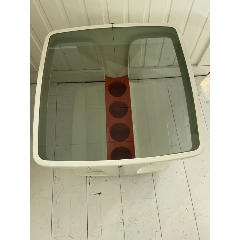 Vintage thermoformed serving table on wheels with a smoked glass top