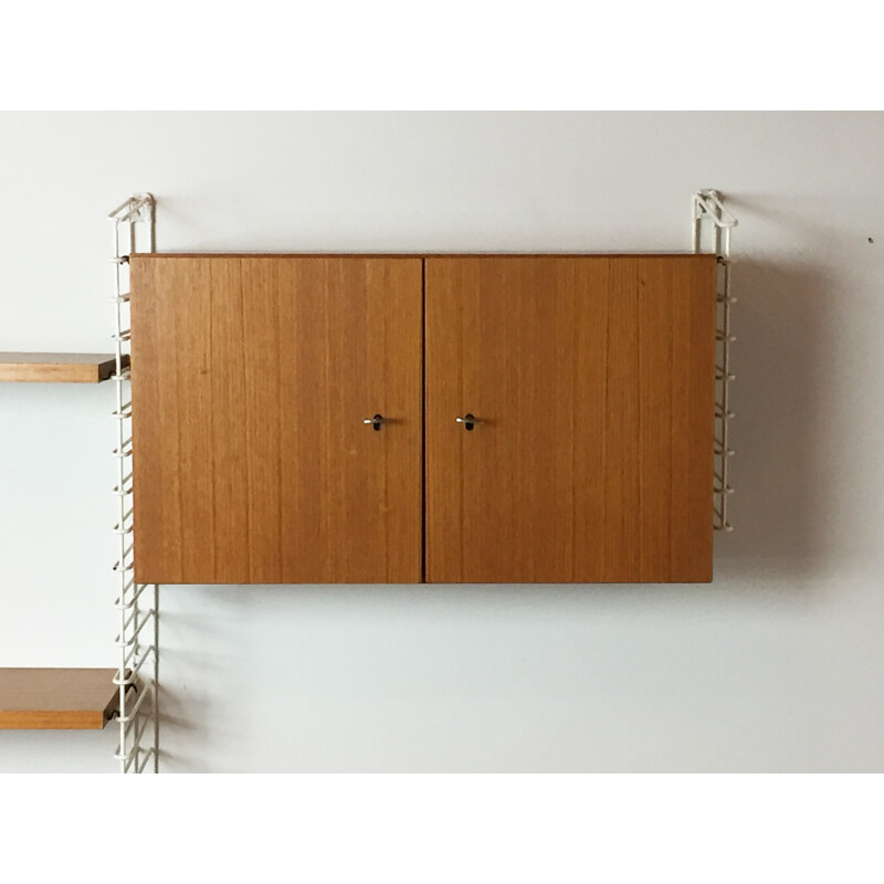German Mustering wall unit in teak and lacquered metal - 1960s