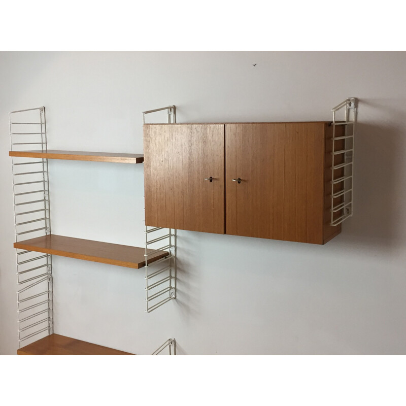 German Mustering wall unit in teak and lacquered metal - 1960s