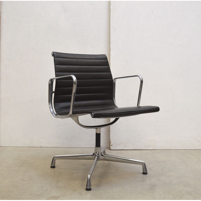 Vintage brown leather Ea108 Alu armchair by Charles Eames for Vitra, 2010