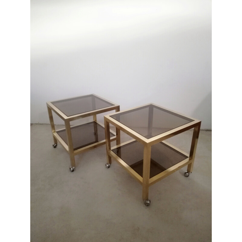 Pair of vintage brass and smoked glass side tables with casters, Italy 1970