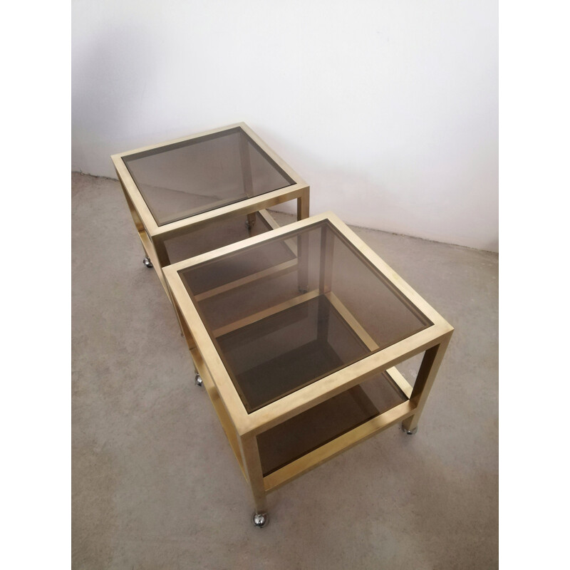 Pair of vintage brass and smoked glass side tables with casters, Italy 1970