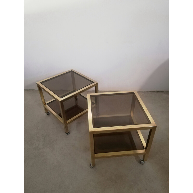 Pair of vintage brass and smoked glass side tables with casters, Italy 1970