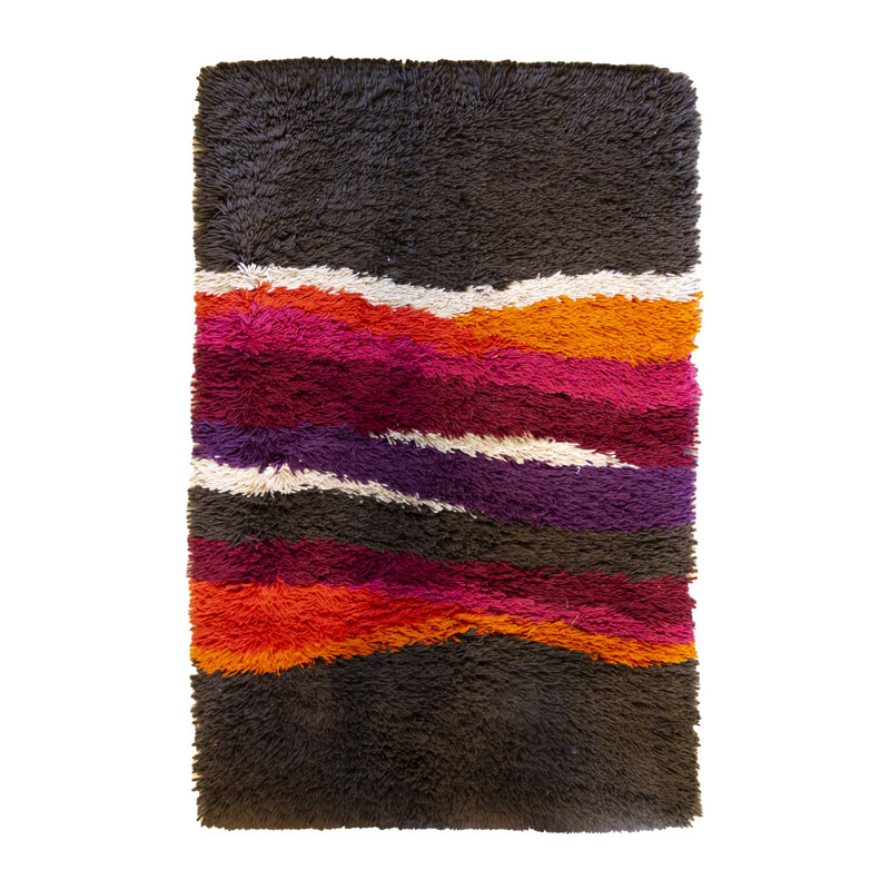 Vintage brown and rainbow Desso rug