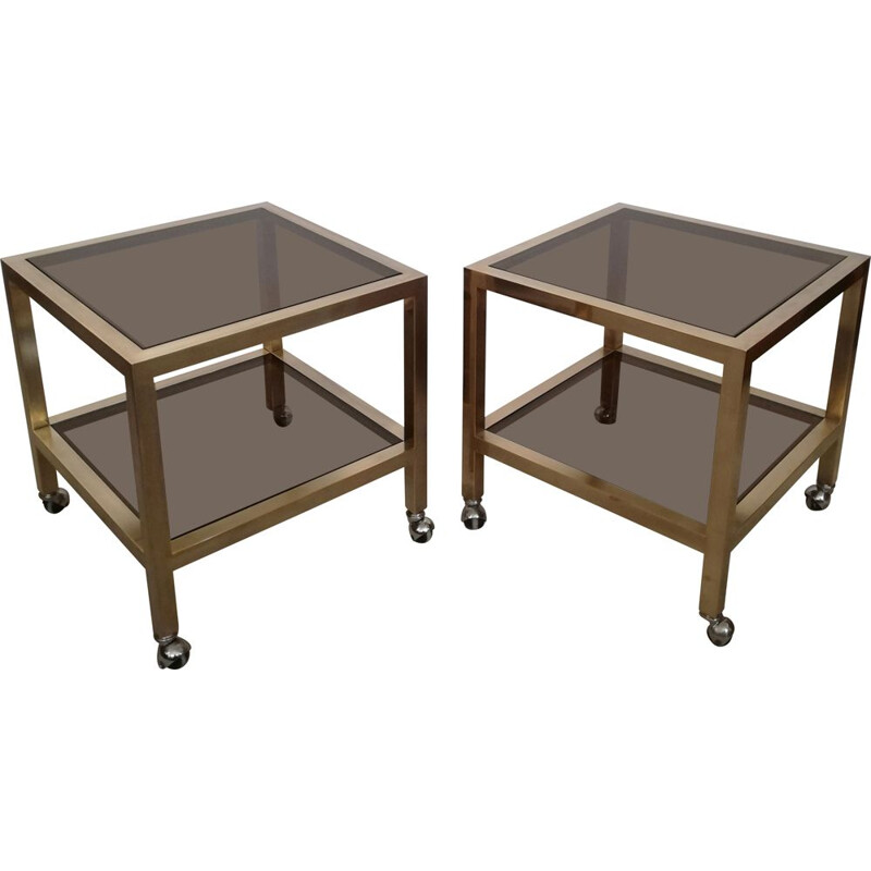 Pair of vintage brass and smoked glass side tables with casters, Italy 1970