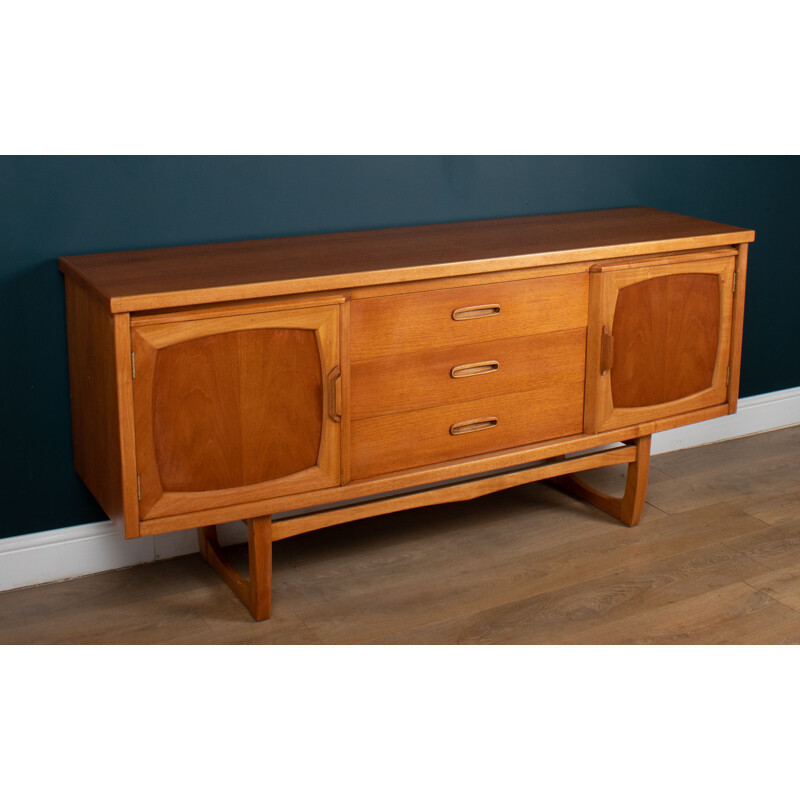 Vintage teak sideboard on sled legs by Jentique, 1960