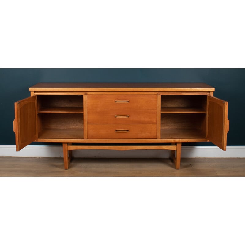 Vintage teak sideboard on sled legs by Jentique, 1960